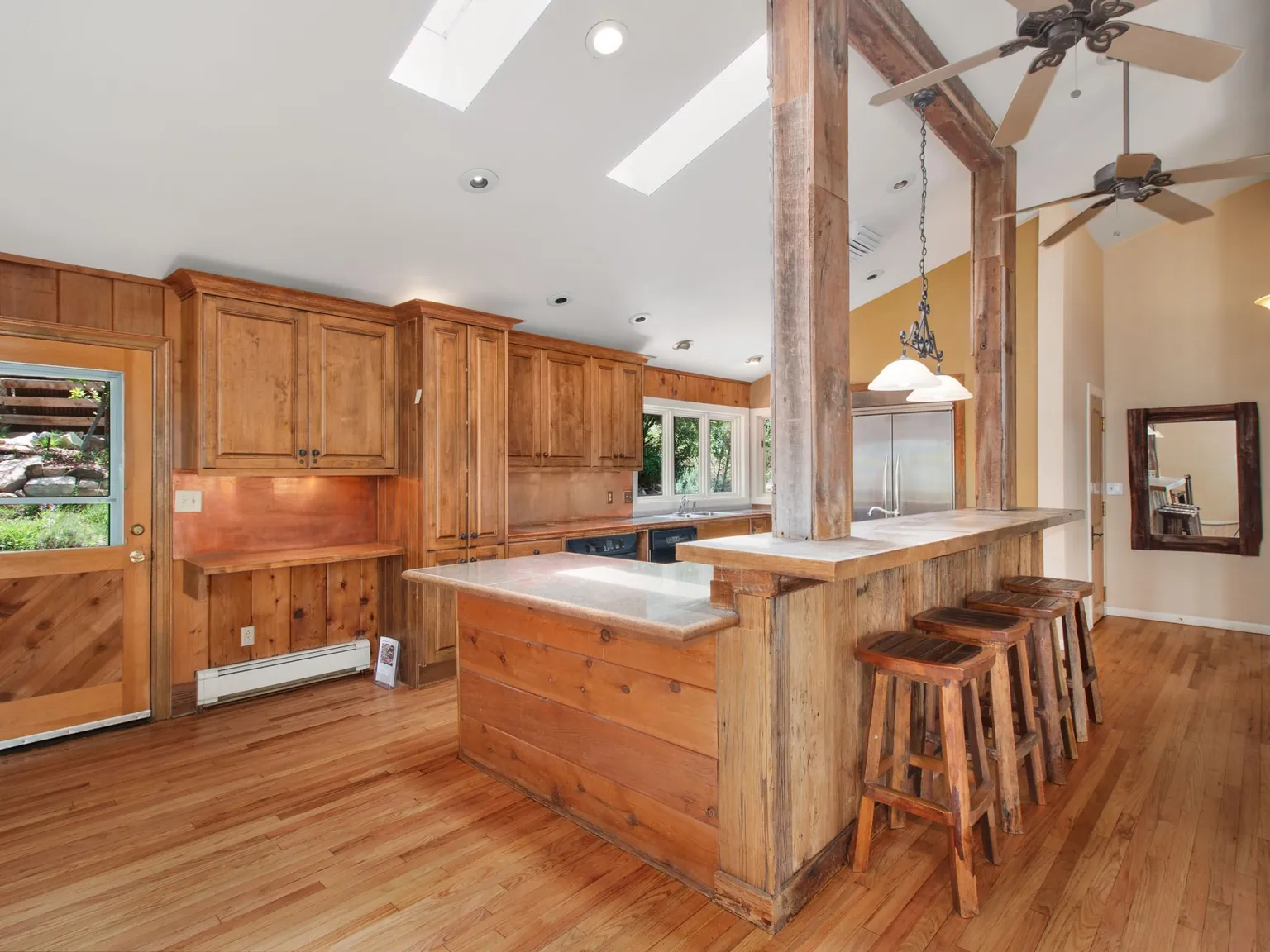 Kitchen with fronts made from reclaimed wood